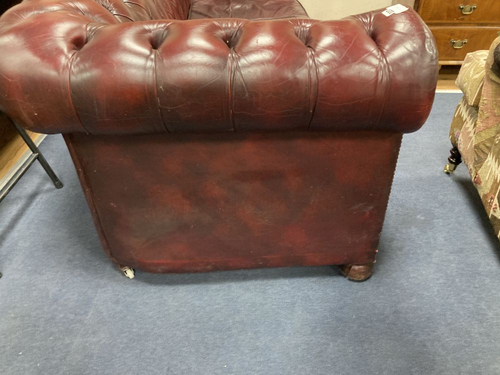 A Victorian style buttoned burgundy leather three seater Chesterfield settee, width 190cm depth 85cm height 72cm